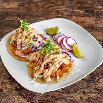 Mesa Maguey signature dishes BurritoEnchiladas VerdeSeafood Tacos